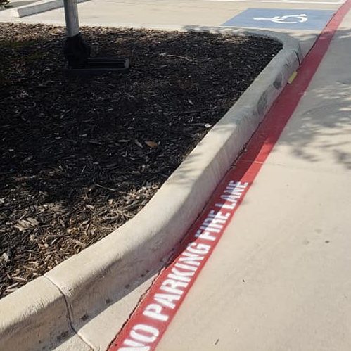 A Picture of a Fire Lane Line On the Ground.